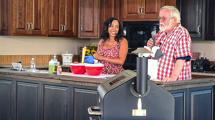 Rick Browne, a former Clark County resident, and Chef Erica Blaire Roby give a presentation Sunday at the ilani BBQ Fest. Browne helped organize the event. Photo by Paul Valencia