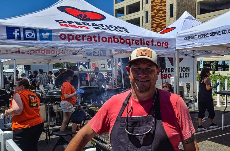 Stan Hays, co-founder of Operation BBQ Relief, said his organization has cooked and served 9.6 million meals in 11 years, deploying to disaster areas to bring comfort food to people in need. Photo by Paul Valencia
