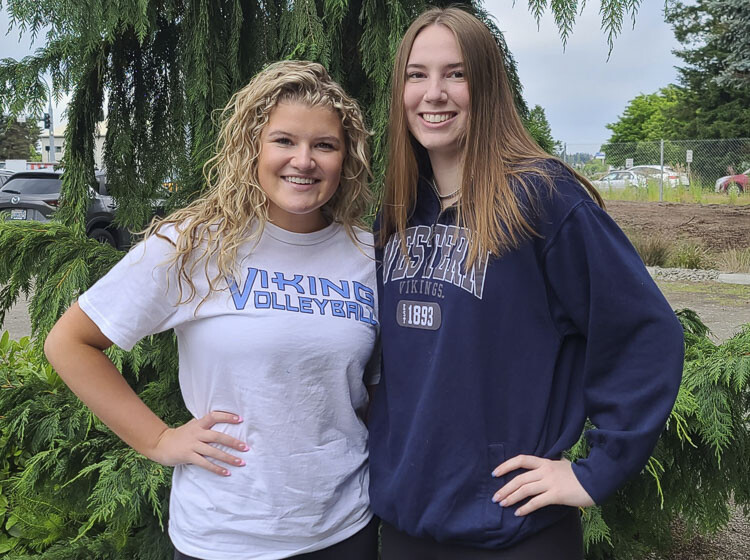 Caroline Hansen, left, of Columbia River, and Emily Vossenkuhl of Ridgefield said they both made a point of going to just about every event they could at their schools this year. Vossenkuhl said she learned to live in the moment during the pandemic. Photo by Paul Valencia