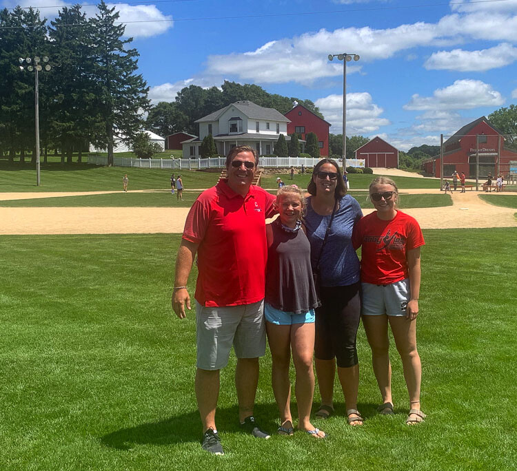 This 2020 photo of Jason Castro and his family was taken at the baseball field in Iowa, home of the famous Field of Dreams. Castro was recently hired as the head baseball coach at Heritage High School. Photo courtesy of the Castro family