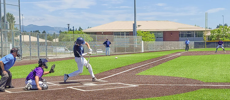 Justin Taylor of the Vancouver Mavericks would hit a single on this pitch Wednesday at the Curt Daniels Invitational Baseball Tournament. The Mavericks, Coast to Coast out of Camas, and NW Futures of Vancouver, are three Clark County teams in the 10-team event hosted at Union High School and Camas High School this week. Photo by Paul Valencia