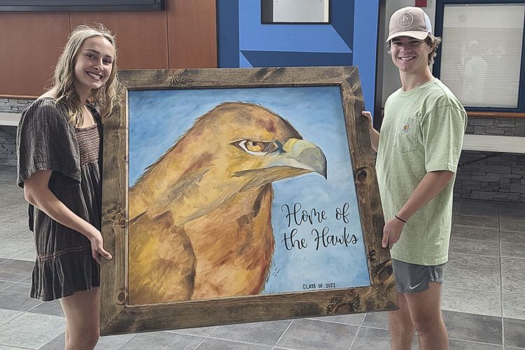 Ellie Ritter, left, and Jackson McNair said the Class of 2022 stuck together, even through the toughest of times during remote learning. When they returned to school, they made the best of their final year together. Photo by Paul Valencia