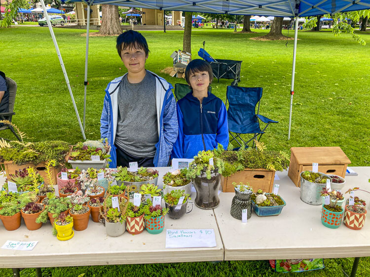 Eleven-year-old Harrison Adams and his brother Henry, age 9, sold potted succulents and homemade bird feeders. They met many enthusiastic customers who were thrilled with their products and pricing. Photo courtesy Jessica Hofer Wilkinson