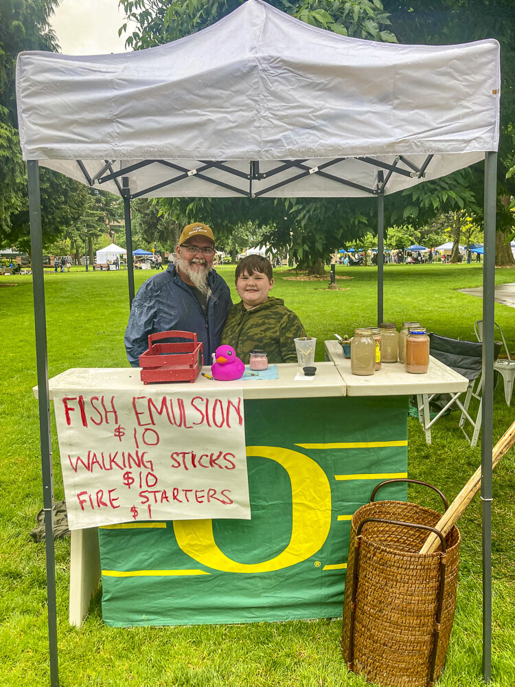 Mason Krause, an 11-year-old outdoorsman who enjoys fishing with his dad, decided to capitalize on his hobbies by creating and selling Fish Emulsion, an organic fish fertilizer for plants. He also sold hand-carved and wood burned walking sticks and homemade fire starters made of paraffin wax and pine shavings, which sold out. Photo courtesy Jessica Hofer Wilkinson