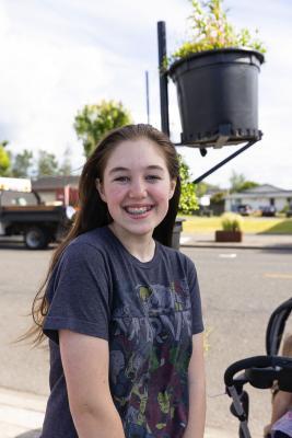 Rhea LaPierre, 14, said Woodland is a special place to live, with “super friendly” people. She loves Planters Days and has missed the traditional celebration the last two years during the pandemic. Photo by Mike Schultz