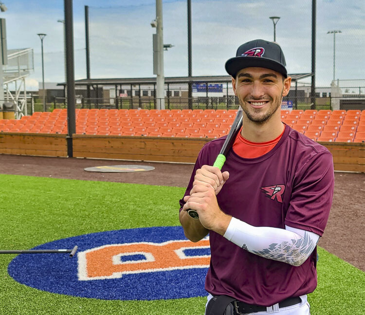 Will Chambers, who led the league in home runs last season, is thrilled to be back with the Ridgefield Raptors. Photo by Paul Valencia