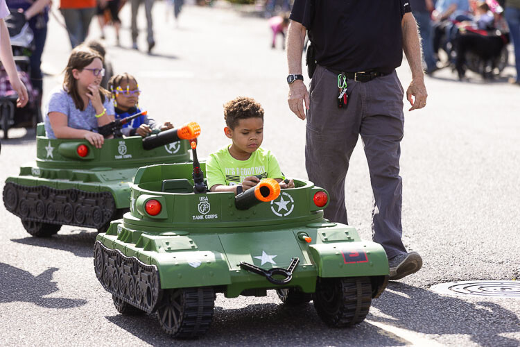 Zayden Jackson powers his tank during the Children’s Parade on Thursday in downtown Woodland. Photo by Mike Schultz