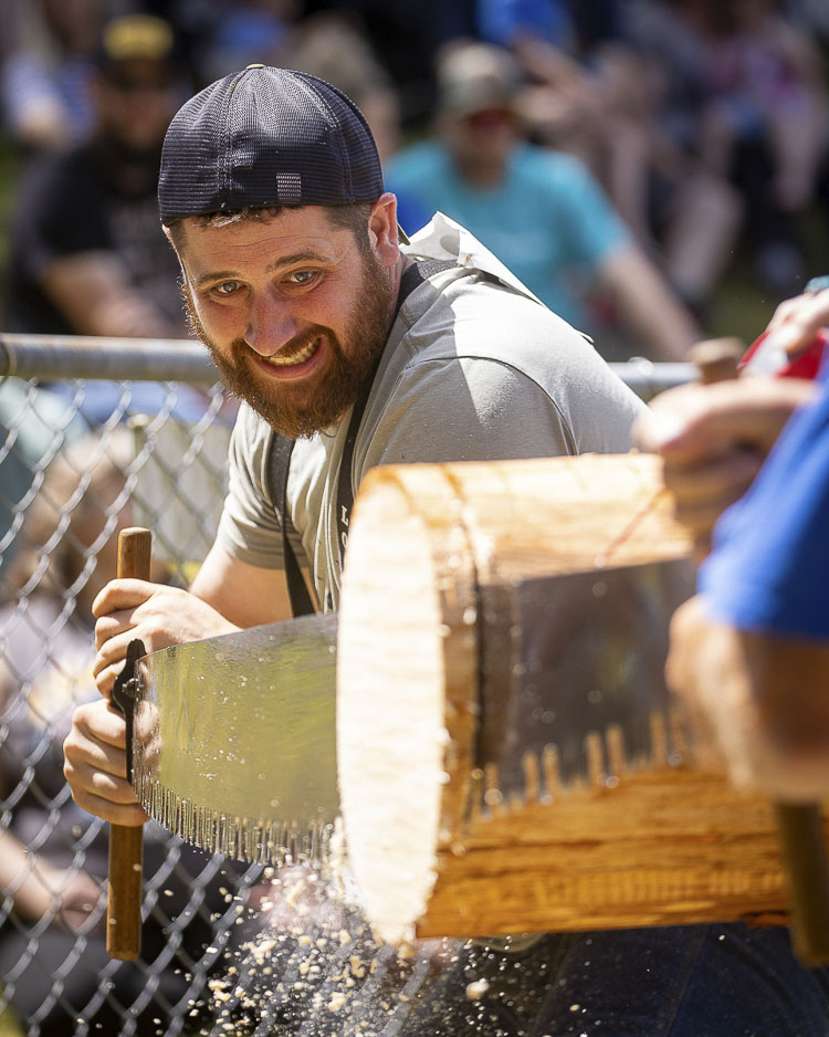 Arthur Fetter (shown here) and his teammate Andy Ralston finished first in the Double Buck Saw competition. Photo by Mike Schultz