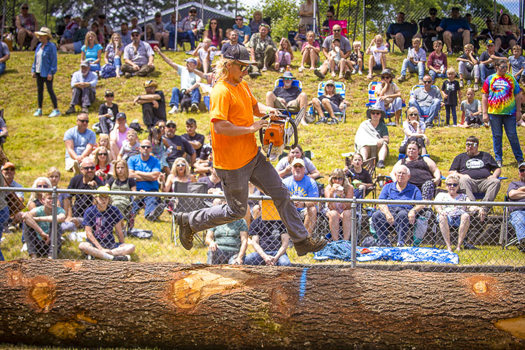 Travis Hafner shows off his skills during the Logging Show. Photo by Mike Schultz
