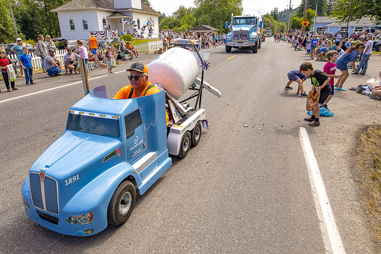 Mike Wagner shows off his own personal mini cement mixer. Photo by Mike Schultz