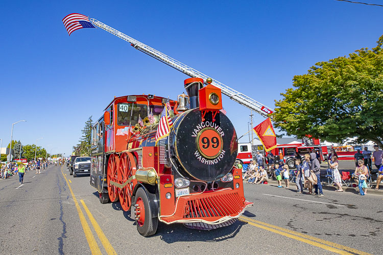 Cranes, trains, and more were showcased at the Harvest Days Parade in Battle Ground in 2019. Photo by Mike Schultz