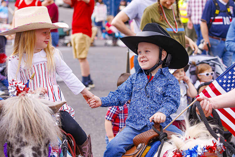 There were no shortage of cute inmates at the Ridgefield 4th of July Kids Parade. Shown here are Sylvia Petty and Jack Bononcini. Photo by Mike Schultz