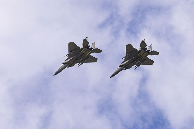 The Oregon Air National Guard F-15s performed a flyover Monday. Photo by Mike Schultz