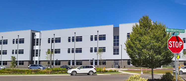 The view of the new, three-story Mountain View High School from Blairmont Drive.