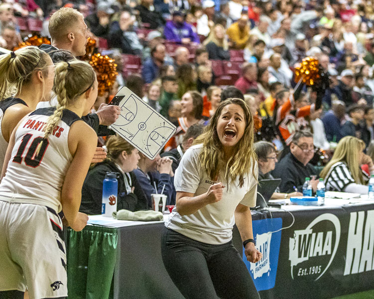 Britney Ervin, seen here celebrating during the 2019 Class 2A state championship basketball game, has resigned as the head coach of the Washougal Panthers. Photo by Mike Schultz