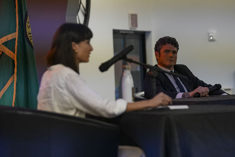 Congressional candidate Joe Kent listens as Marie Gluesenkamp Perez answers a question at Monday’s event. Photo courtesy Joseph Gary