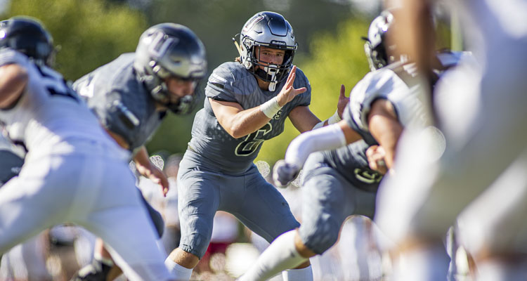 Union quarterback Tyson Fuehrer maintained his focus and nearly led the Titans to a come-from-behind victory on Saturday. The Titans came up short, but the lessons they learned will go beyond football. Photo courtesy Heather Tianen