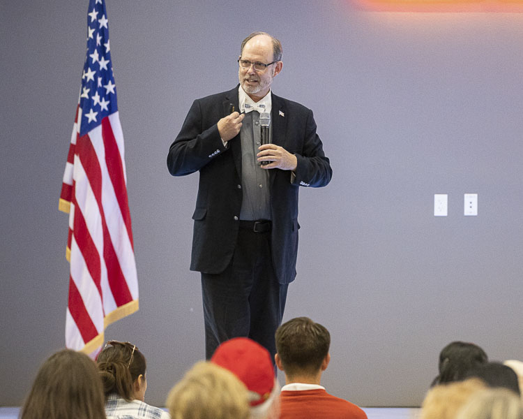 Dr. Douglas Frank told the crowd how the voter rolls are being manipulated allowing phantom voters into election totals. Photo by Mike Schultz