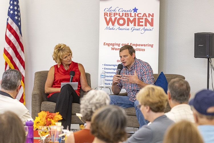 Clark County auditor candidate Brett Simpson (right) answers questions from Clark County Republican Women’s President Liz Pike (left) at an event held Friday in Vancouver. Photo by Mike Schultz