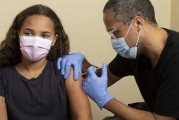 CDC panel votes 15-0 to add COVID vaccine to routine childhood shots