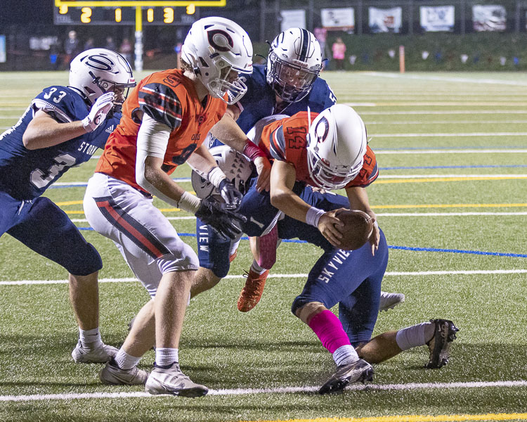 Camas quarterback Taylor Ioane scored on this running play, but he did most of his damage with his arm. Ioane threw for 356 yards and three touchdowns as Camas rallied to beat Skyview. Photo by Mike Schultz