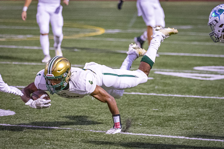 Jonathan Landry is not Superman. He just looks like Superman on the football field, dominating on offense and defense for the Evergreen Plainsmen. Photo by Mike Schultz