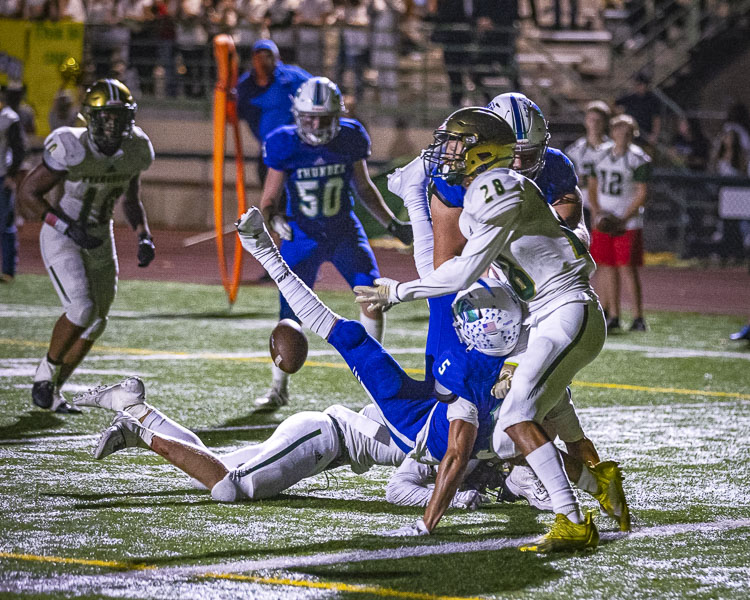 The ball is loose just prior to Mountain View getting into the end zone in the closing seconds of Friday’s game. Evergreen would recover, winning 20-14. Photo by Mike Schultz