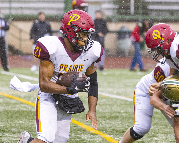 Prairie senior Alex Ford was focused on having a big return to the football field Friday night. It did not last long. He injured his left knee. Still, he was a big part of Prairie’s victory. Photo by Mike Schultz