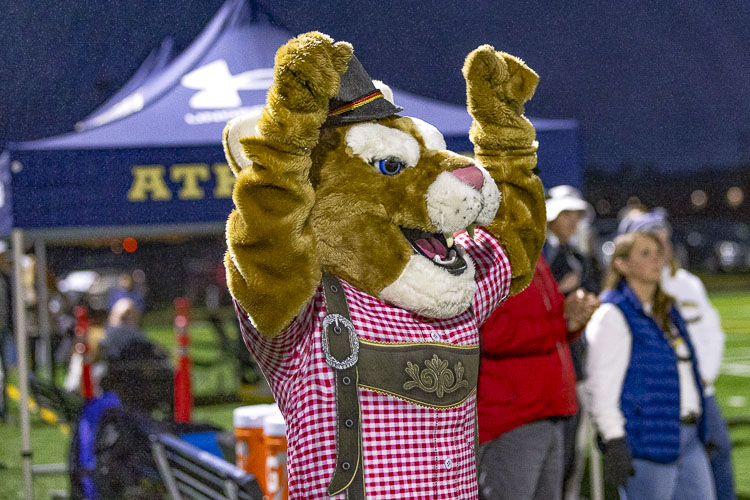 Seton Catholic wants a friendly rivalry with King’s Way Christian. What’s more friendly than a Cougar in an Oktoberfest outfit? Photo by Mike Schultz