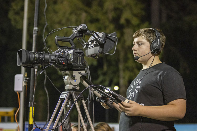 Sam Howard, a sophomore from Skyview, can operate a camera or work in the control booth for VPS Game Time. He says he works whatever assignment is needed for any broadcast. Photo by Mike Schultz