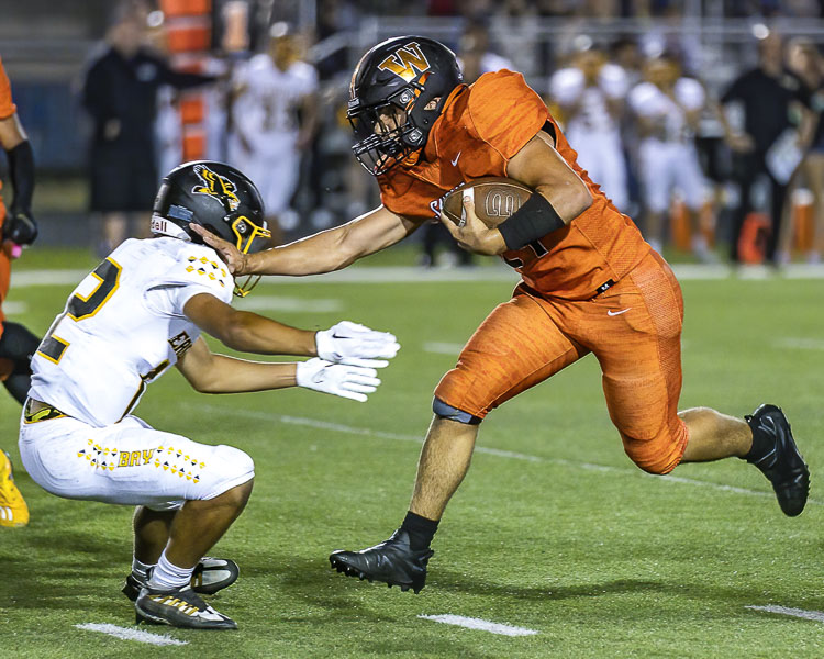 Liam Atkin of Washougal averaged more than 12 yards per carry Friday night, gaining 152 yards on the ground with two touchdowns. Photo by Mike Schultz