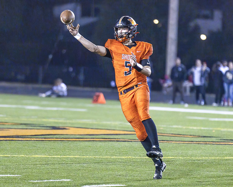 Holden Bea, behind great protection from his offensive linemen, rushed for 51 yards and a score and threw for three touchdown passes on Friday. Photo by Mike Schultz