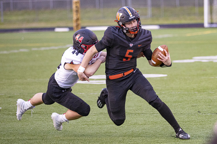 Washougal’s Holden Bea is a dual-threat quarterback who has helped his team to the Class 2A state football playoffs. Photo by Mike Schultz