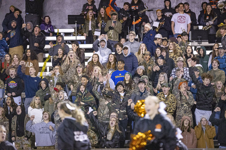 They might be hard to spot because it was, after all, Camo Night, but the student section showed up Saturday night to cheer on the Washougal Panthers. Photo by Mike Schultz