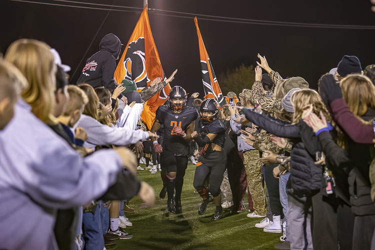 Washougal’s fans, and players, celebrated the team’s first home playoff football game since 1994. Photo by Mike Schultz