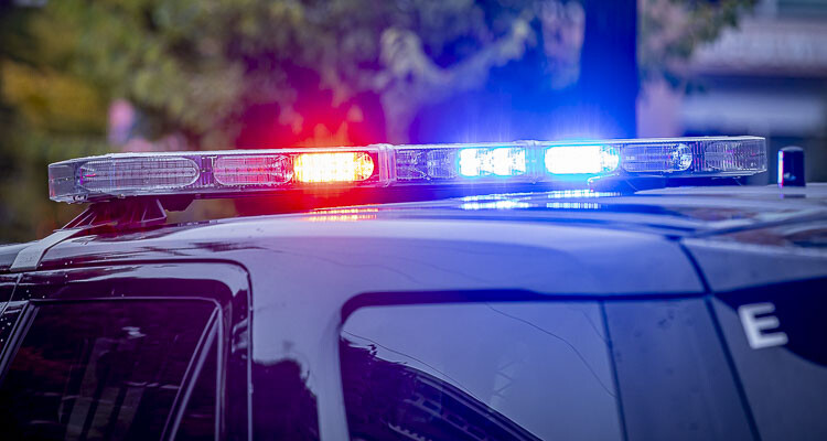 Report indicates a man who reportedly kicked in the door of an apartment was shot and killed by a resident.