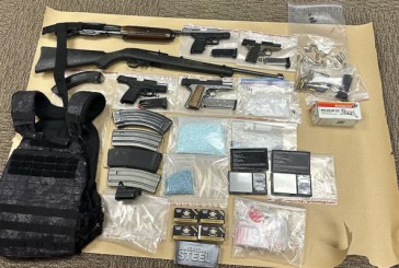 Sheriff deputy's investigation into a wanted person leads to recovery of stolen firearms and drugs