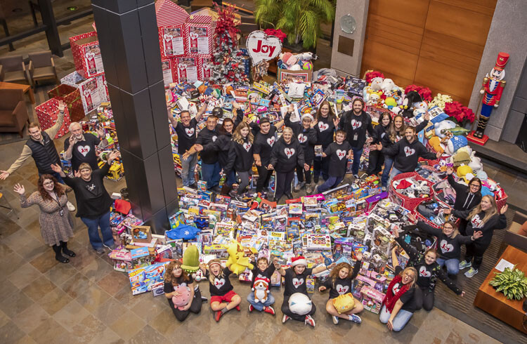 City employee and community volunteers and Cochran family with the 2022 drive haul. Photo courtesy city of Vancouver