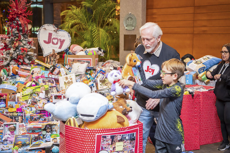 City employees and kids help sort toys. Photo courtesy city of Vancouver
