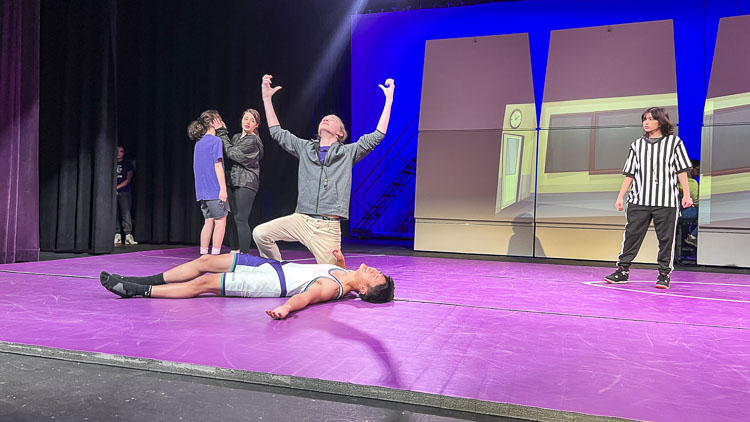 Payton Graham, who plays wrestling coach Royal McKay, said it is challenging to originate a role. Wrestling! The Musical makes its world debut on Thursday at Heritage High School. Photo courtesy Heritage High School