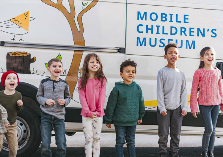 The Mobile Museum is phase two of the Columbia Play Project, which consists of a van and trailer filled with equipment, art materials, and toys that can be loaded up and brought to a park, a business, or anywhere with enough space to allow children to gather and play in what the group calls a Pop Up Party. Photo courtesy Leah Anaya