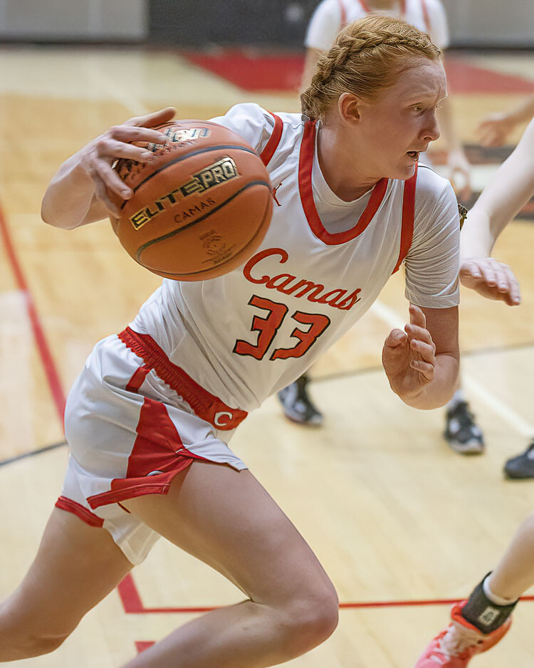 Camas junior Addison Harris, shown here last week in the bi-district tournament, scored 12 points Wednesday night in the semifinals. Photo by Mike Schultz