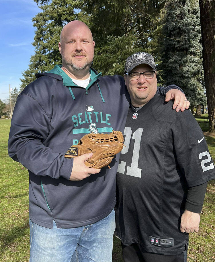 John Scukanec, left, and Paul Valencia met up prior to the Super Bowl on Sunday to have a catch. Scukanec said playing catch is just a vehicle to learn more about people. Photo courtesy Jenny Valencia