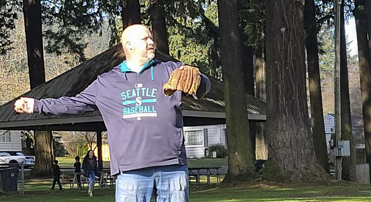 Tuesday will mark the 350th day that John Scukanec of Washougal has played catch with someone in his quest to play catch every day for a year. Photo courtesy Jenny Valencia