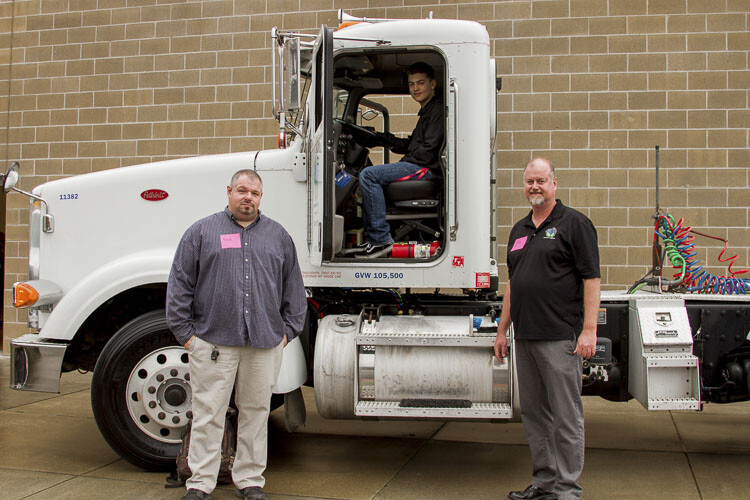 Tribeca Transport, a local trucking company, brought a semi truck to talk to students about careers in cargo transport. Photo courtesy Woodland School District