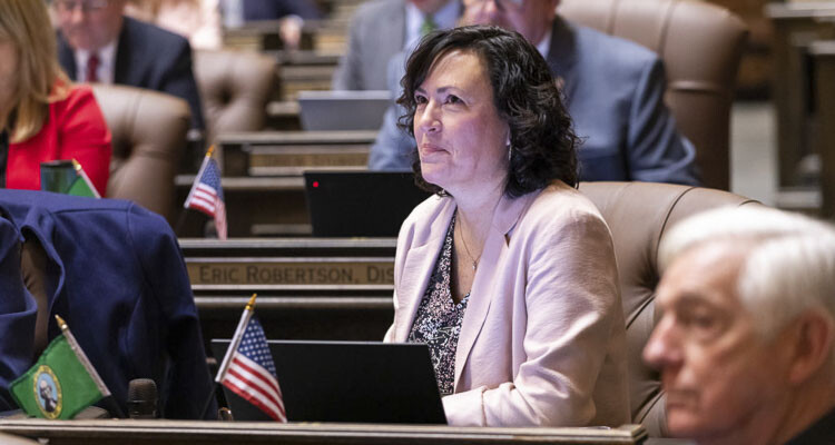 Rep. Stephanie McClintock's first bill, to help streamline the business licensing process in Washington, is headed to the state Senate.