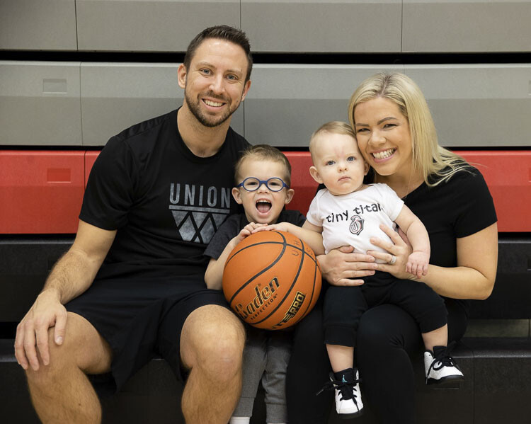 Blake and Christie Conley, with their sons Sammy and Leo, will have more time together now that Blake has resigned as head coach of the Union boys basketball team. Photo courtesy Heather Tianen