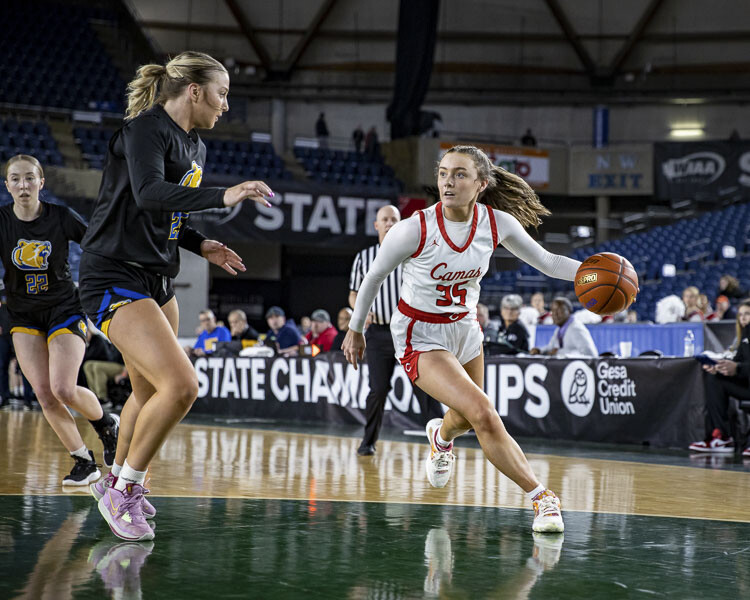 Camas point guard Keirra Thompson drives past the Tahoma defense Friday night in the Tacoma Dome. Thompson scored 12 points, helping the Papermakers reach the state championship game. Photo courtesy Heather Tianen
