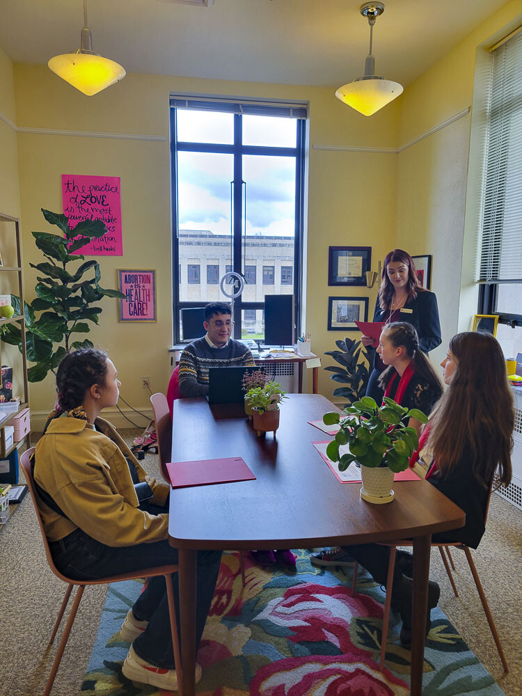 DREAM Team members Lacey Brown (7th Grade, Amboy Middle School), Piper Strong (8th Grade, Chief Umtuch Middle School), and Kara Doughty (7th Grade, Chief Umtuch Middle School) talk with Senator Emily Randall’s Legislative Assistant. Photo courtesy Battle Ground Prevention Alliance