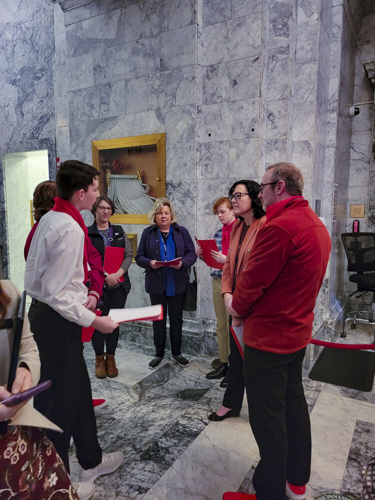 DREAM Team members Brigham Sorensen (front left), Lucas Goranson, and Micah Hoyt (7th Graders at Chief Umtuch Middle School) talk with Rep. Stephanie McClintock outside the Senate Chamber at the Washington State Capitol on March 6, 2023. Photo courtesy Battle Ground Prevention Alliance